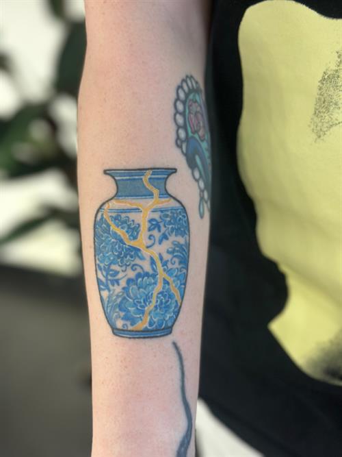 kintsugi vase tattoo