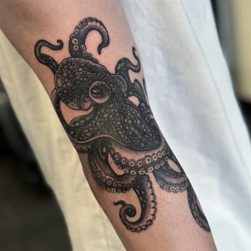 neotraditional octopus detailed forearm sleeve pepper shading dotwork stipple black and grey tattoo