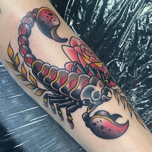 traditional scorpion rose leg tattoo