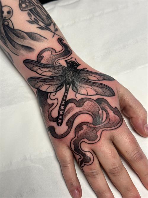 smokey dragonfly black and grey pepper shading dotwork stippling hand tattoo