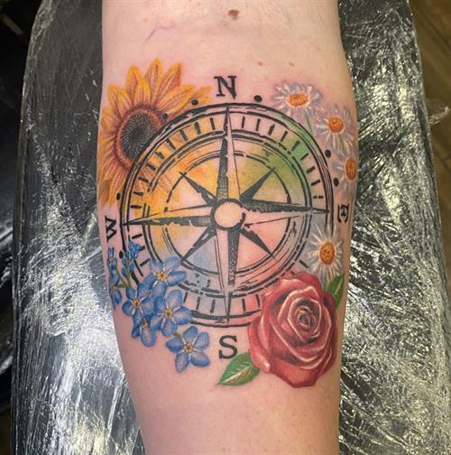floral compass tattoo
